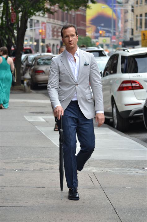 grey sport coat navy pants.